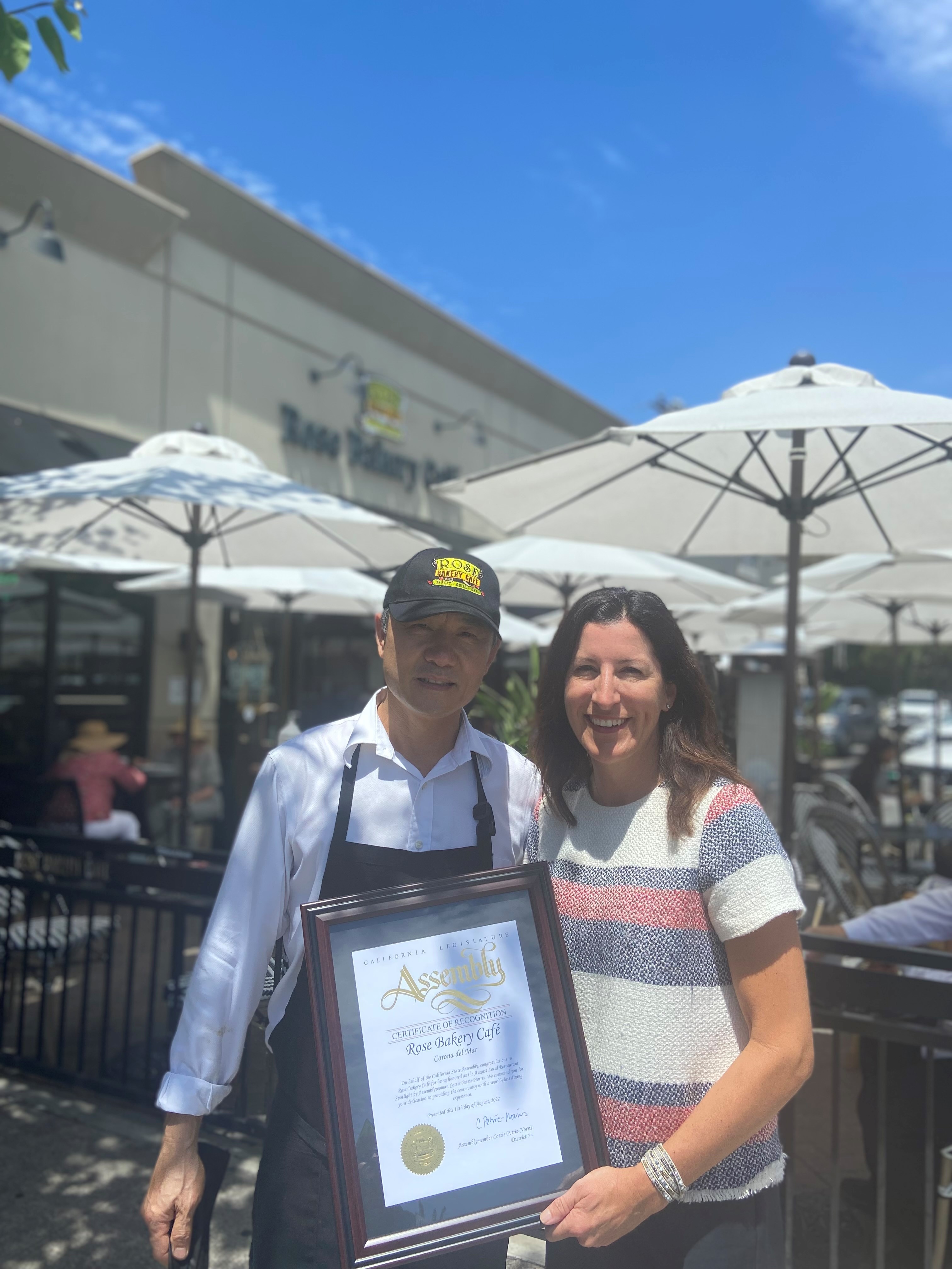 Rose Bakery Café owner Shawn Lim with Assemblywoman Cottie Petrie-Norris.