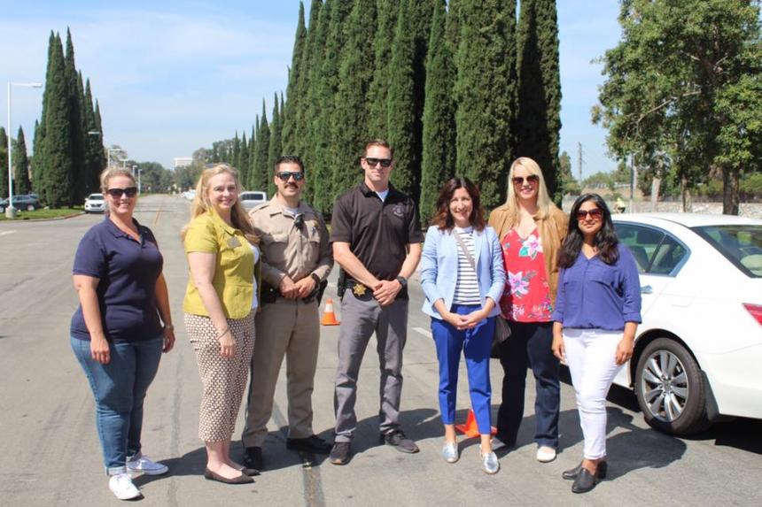 Asm. Petrie-Norris with Irvine Councilwomen Melissa Fox and Farrah Khan and Aliso Viejo Councilwoman Tiffany Ackley, and California Highway Patrol officers.