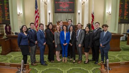 Assemblymember Petrie-Norris and staff on the Assembly Floor